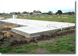 Photo of a concrete slab on the ground.