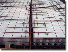 Photo of polystyrene void forms below the reinforcement.