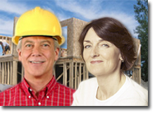 A photo of a builder and a client standing in front of an unfinished house.