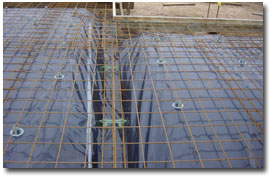 Photo of a square mesh trench.