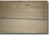 Photo of a piece of preserved treated pine.