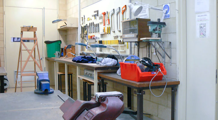 Photo of a work area with some safety hazards