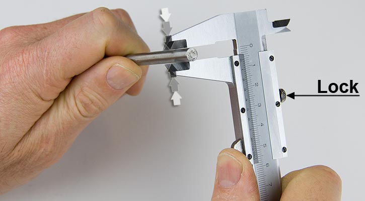 Image showing measurement of a shaft with a vernier caliper