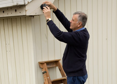 Image showing a worker on a ladder