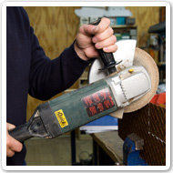 Photo of a person using an angle grinder