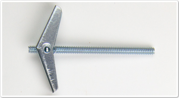 Photo of a fixing device with a metal thread and spring loaded winged nut