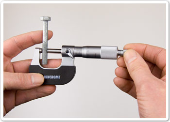 Measuring diameter of a bolt using a micrometer