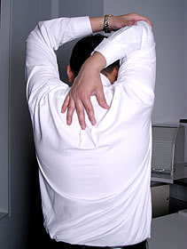 Person performing shoulder stretch