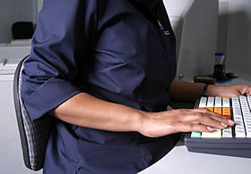 Person at keyboard typing