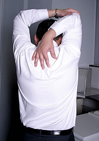 Person stretching whilst seated